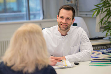 Physician in consultation with patient